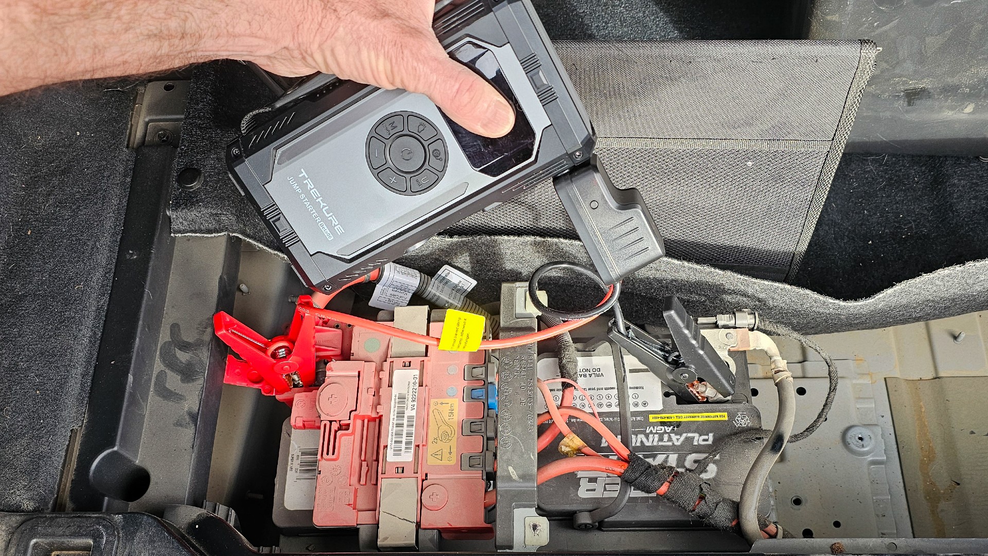 Tekure in use jumping ATV battery