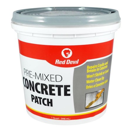  A tub of the Red Devil Premixed Concrete Patch on a white background.