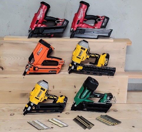 A group of the best cordless framing nailer options grouped together on wood risers