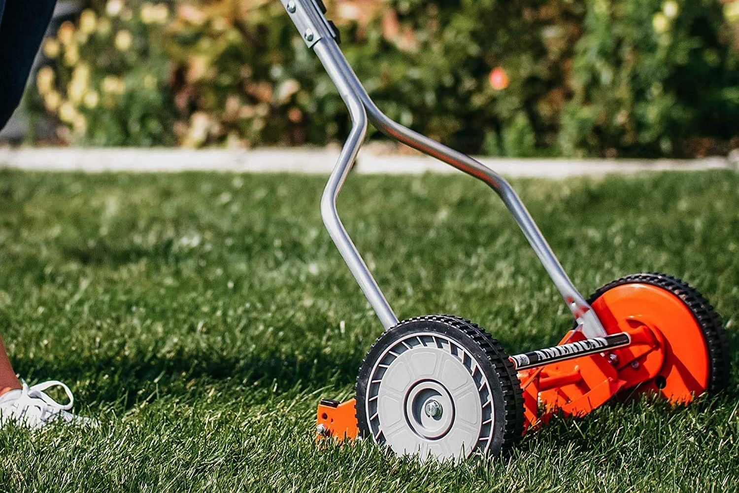 The best push mower option in use mowing a lawn