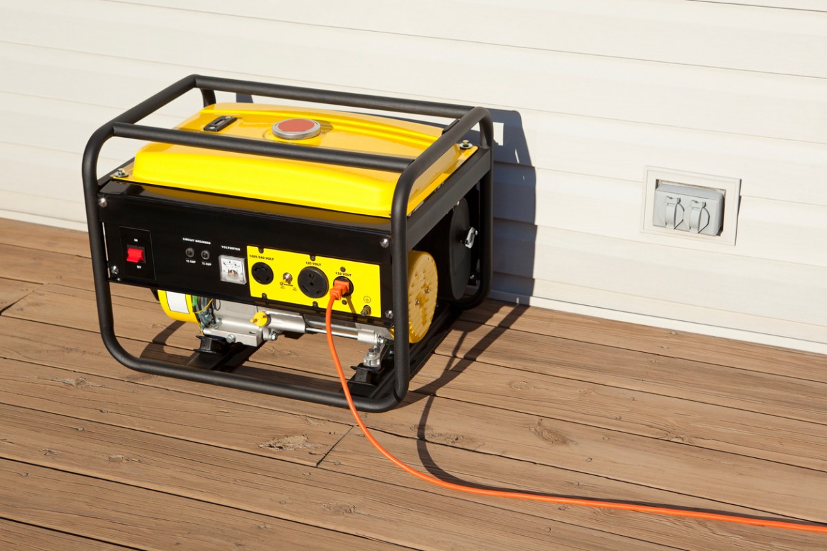 "Extension cord plugged into a gasoline powered, 4000 watt, portable electric generator.Please also see;"
