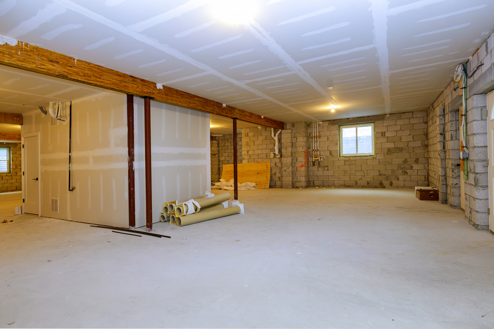 A view of an unfinished basement. 