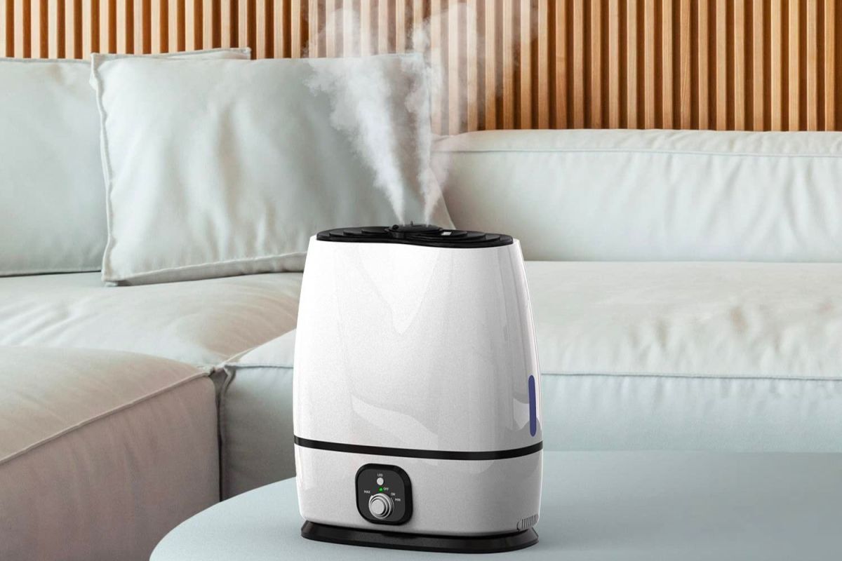 The best humidifier for large room options on a coffee table next to a couch