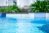 A close-up of a sparkling backyard pool.