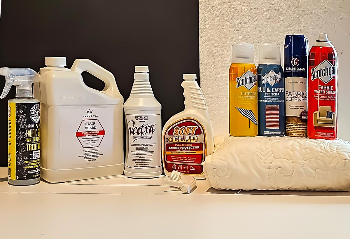 A group of the best fabric protector options together on a counter.