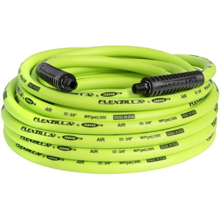  The Flexzilla ⅜-Inch 50-Foot Air Hose stretched out on the ground next to a car tire.