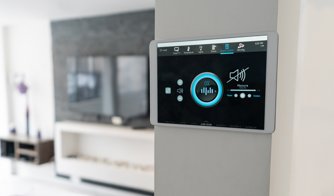 Close-up on a home automation system controlling the music at the house - smart home concepts