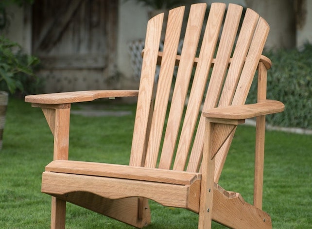 Classic Adirondack chair in natural, unpainted wood
