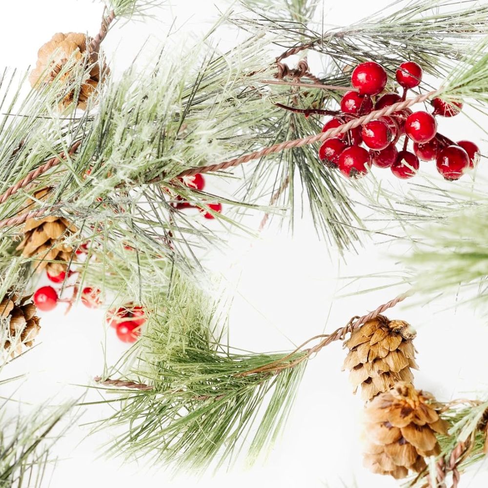 The Best Christmas Decorations Option: CraftMore Christmas Smokey Pine and Red Berry Garland