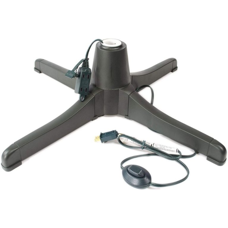  The Puleo International green Rotating Tree Stand on a white background with foot pedal power pedal