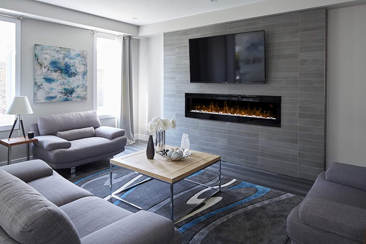 The best gas fireplace insert installed in a contemporary gray hearth in a modern living room