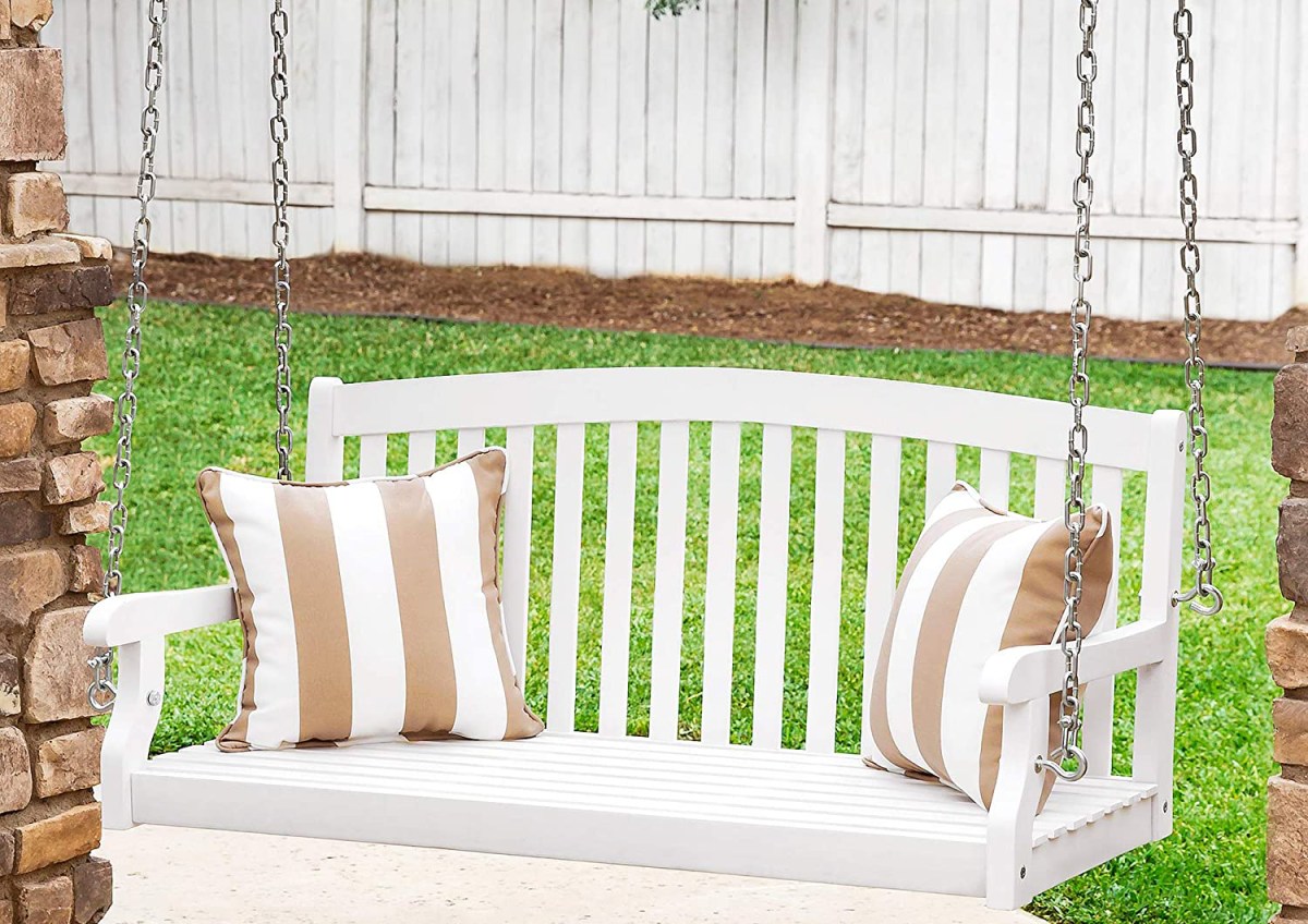 The Best Porch Swings Option hanging in a yard