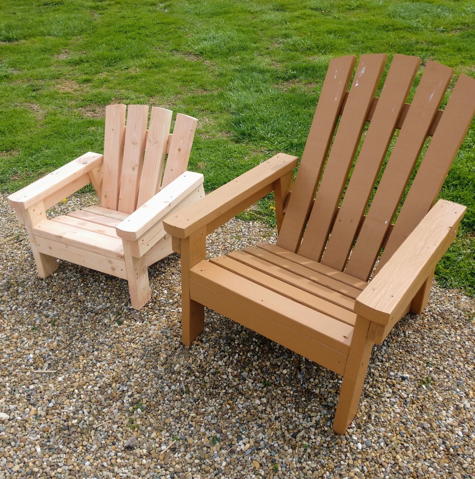 Wood child-sized Adirondack chair next to regular-sized Adirondack chair
