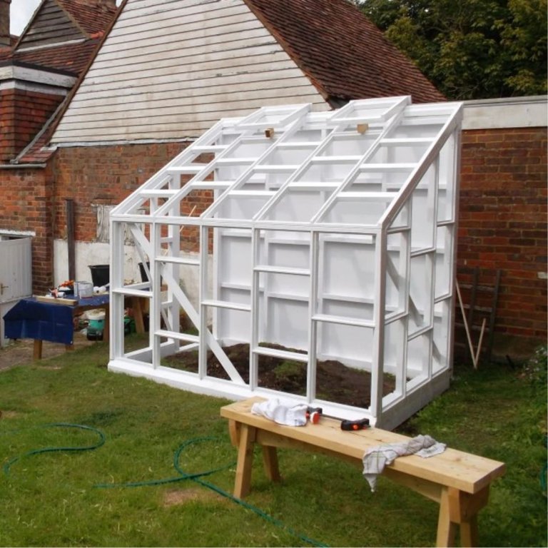 Lean-To Glasshouse Plans built out in the backyard