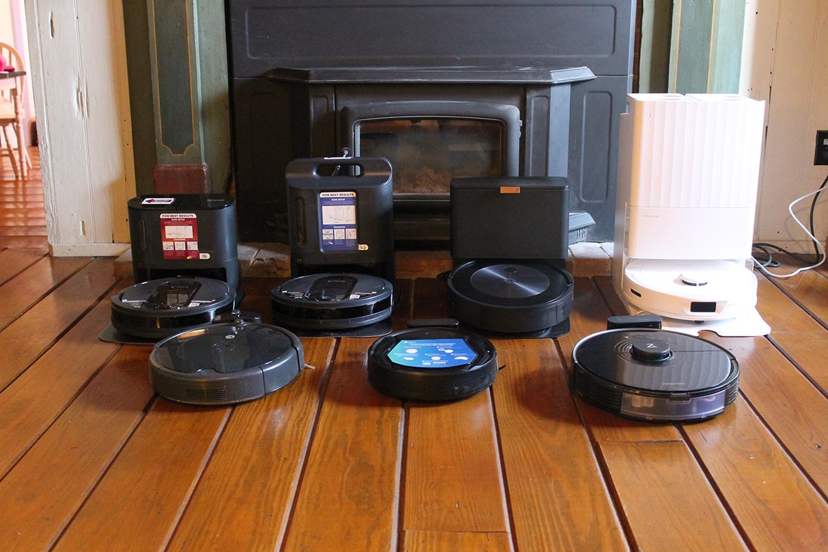 A group of the Best Robot Vacuums for Hardwood Floors together on a wood floor before testing.