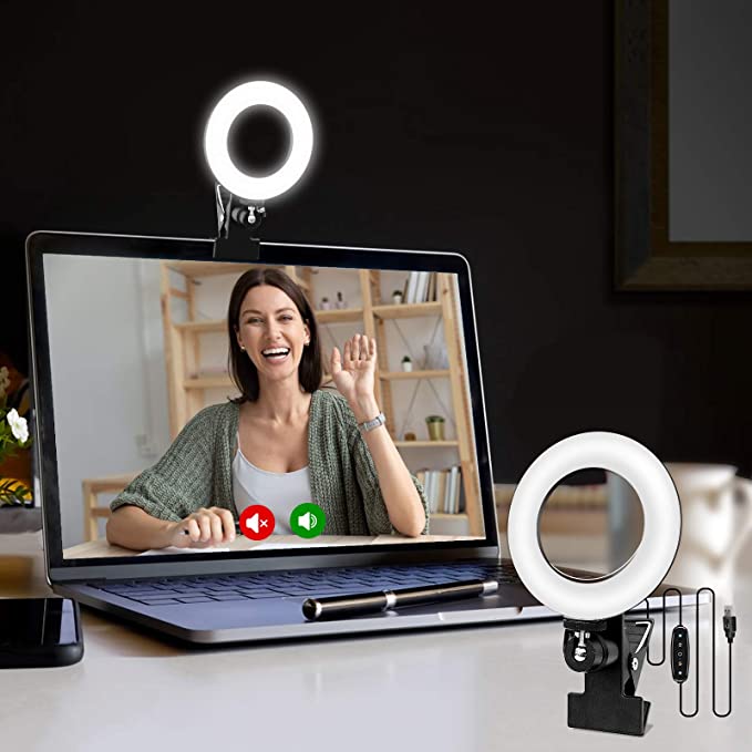 Video calling on laptop with ring light on screen