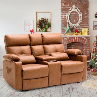 The Consofa Power Reclining Loveseat next to a fireplace and Christmas tree.