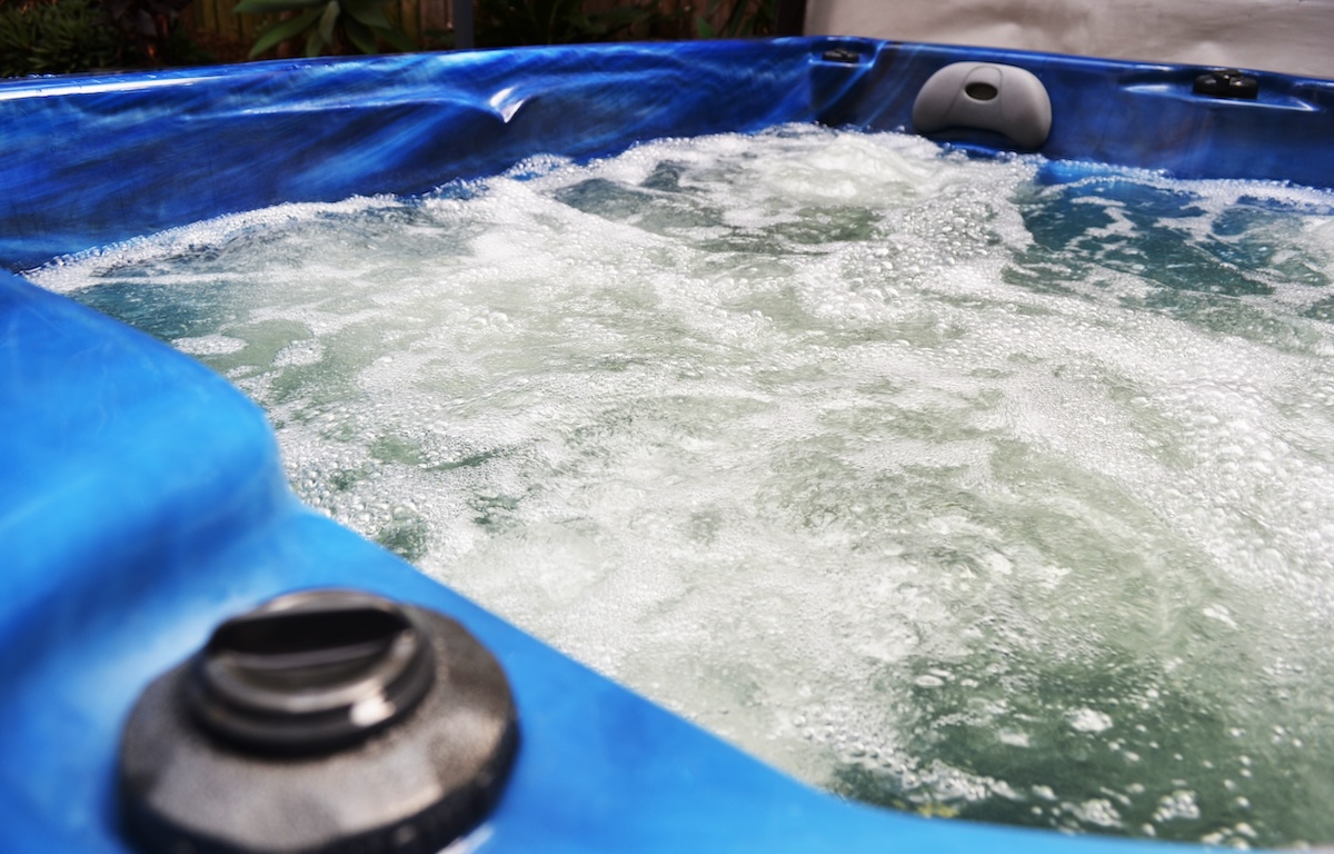 How to Drain a Hot Tub—and Why You Should Do It Soon