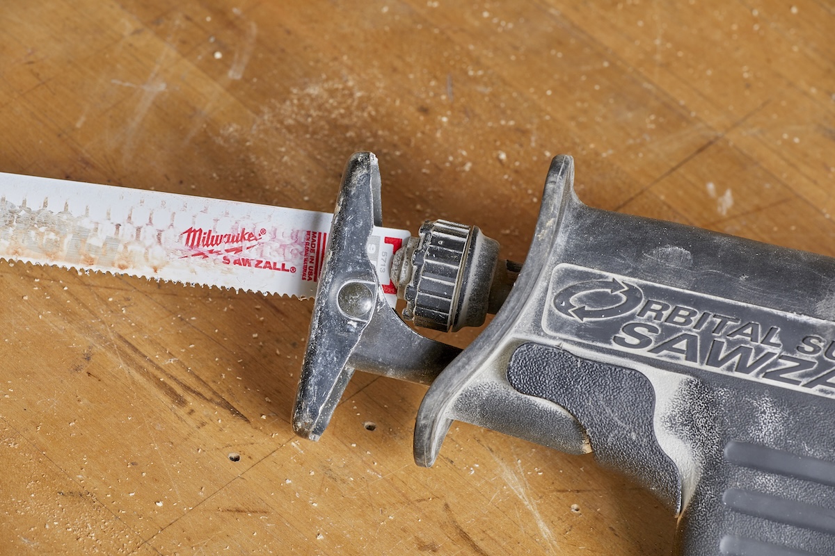 Closeup of the blade mechanism of a reciprocating saw