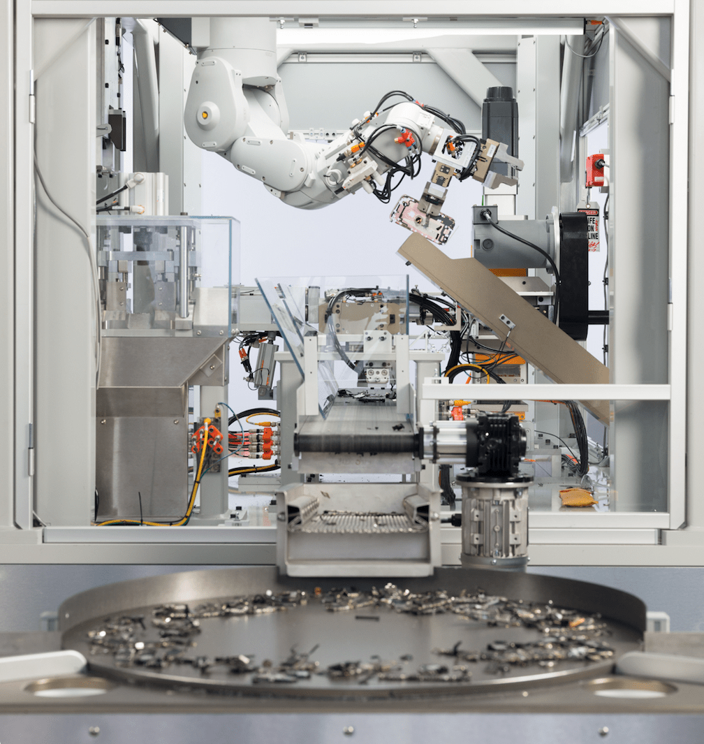 A product shot of a large machine that recycles iPhones.
