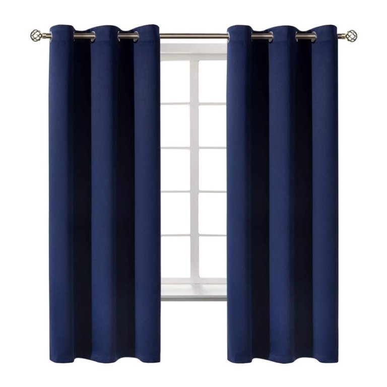  A navy blue pair of BGment Thermal Blackout Curtains for Bedroom installed over a paned window.
