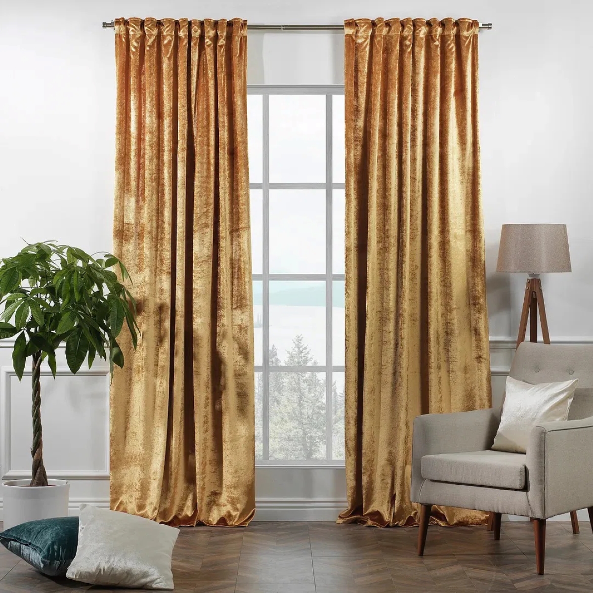 Long gold curtain hung above window.