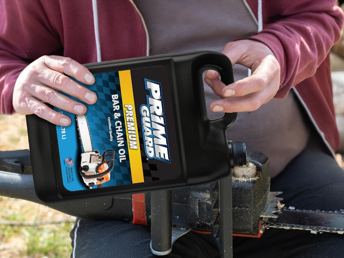 a man is putting one of The Best Chainsaw Bar Oil option in a chainsaw
