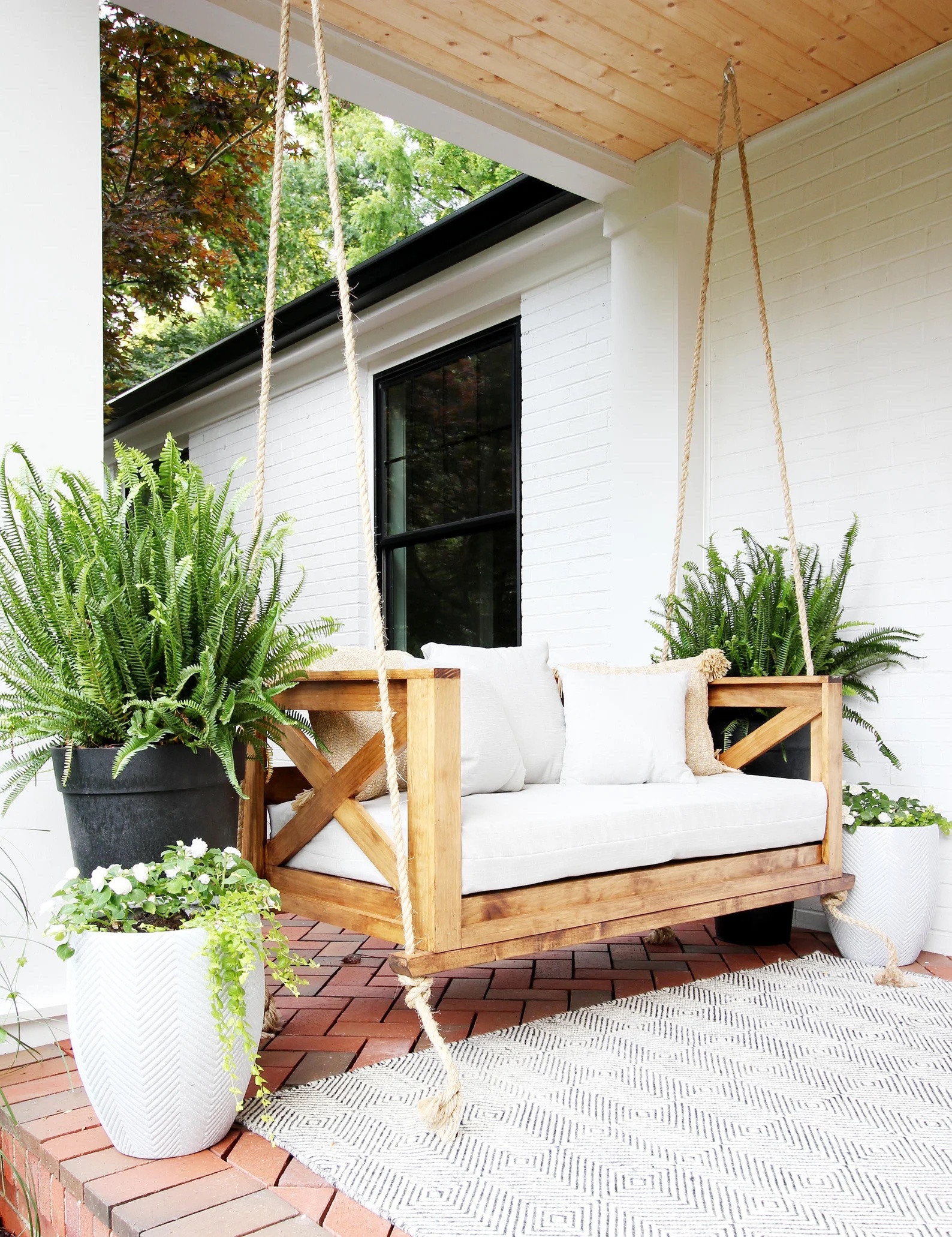 Porch Swing Building Plans A DIY Wood Porch Swing With Cup Holders