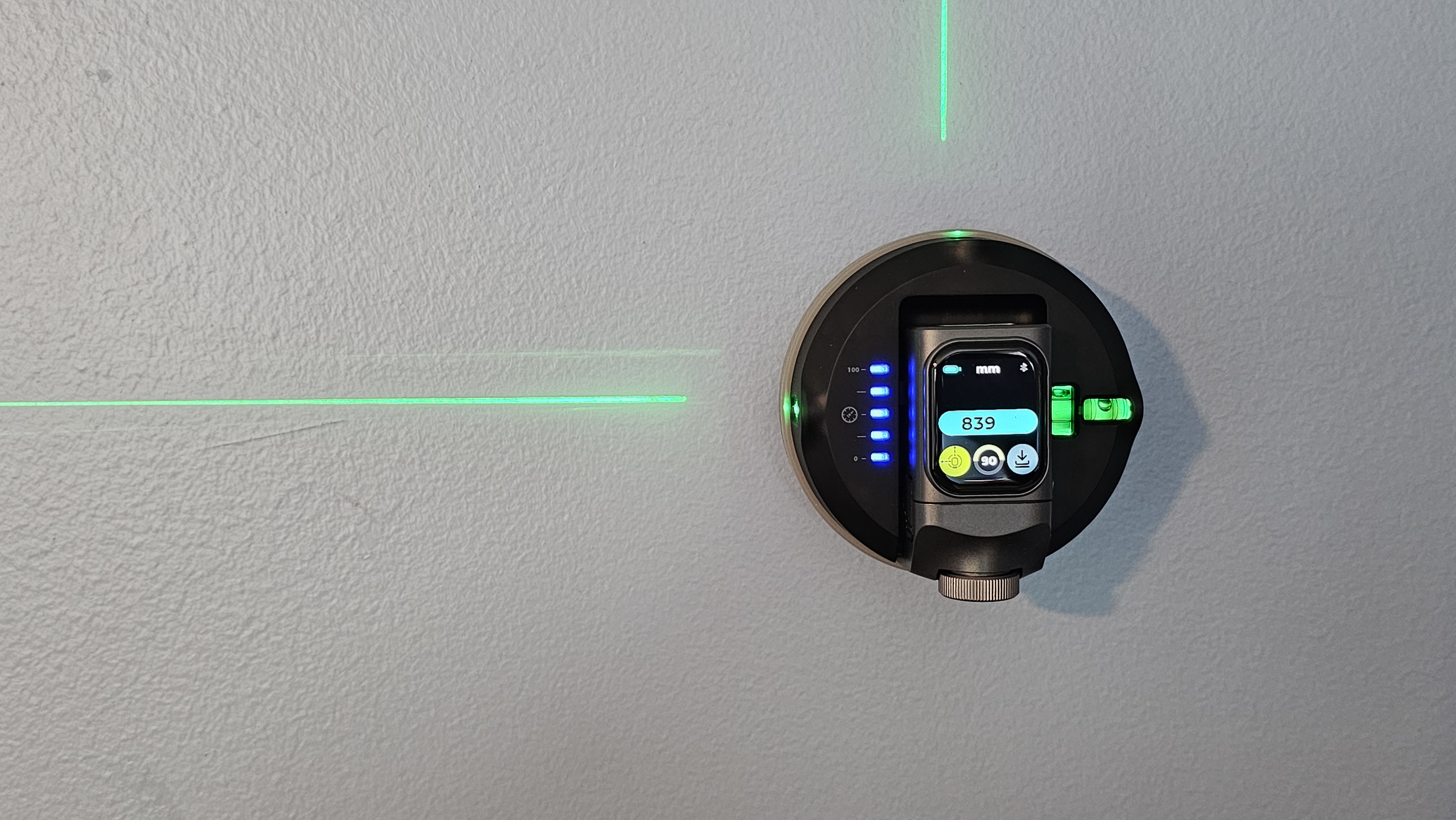 Hozo Cube being used on a wall