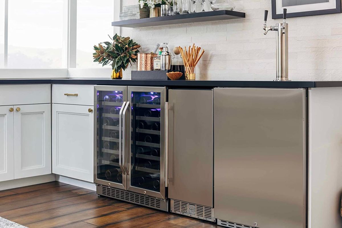 The best undercounter ice machine in a well-appointed kitchen, installed between a wine fridge and dishwasher