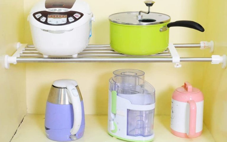 Tension Rod storage shelves with pots and appliances on them.