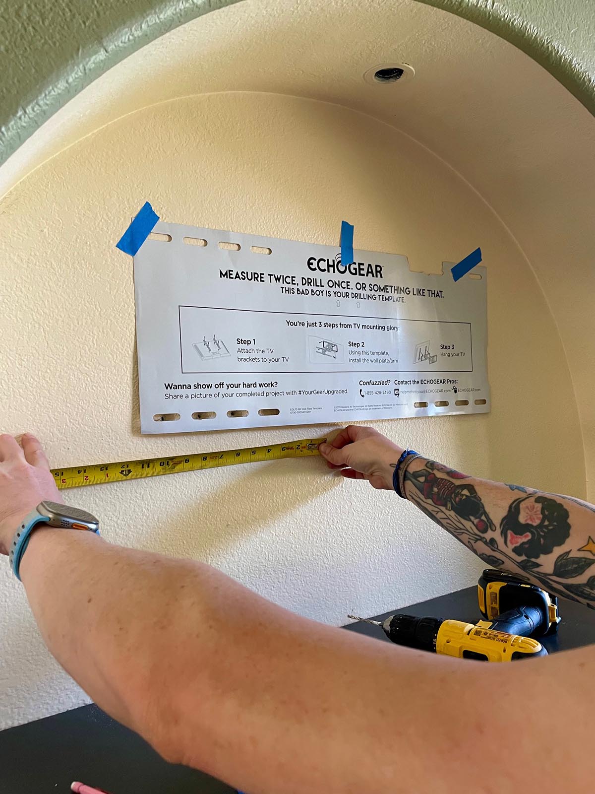 Echogear Full-Motion TV Wall Mount measuring for studs