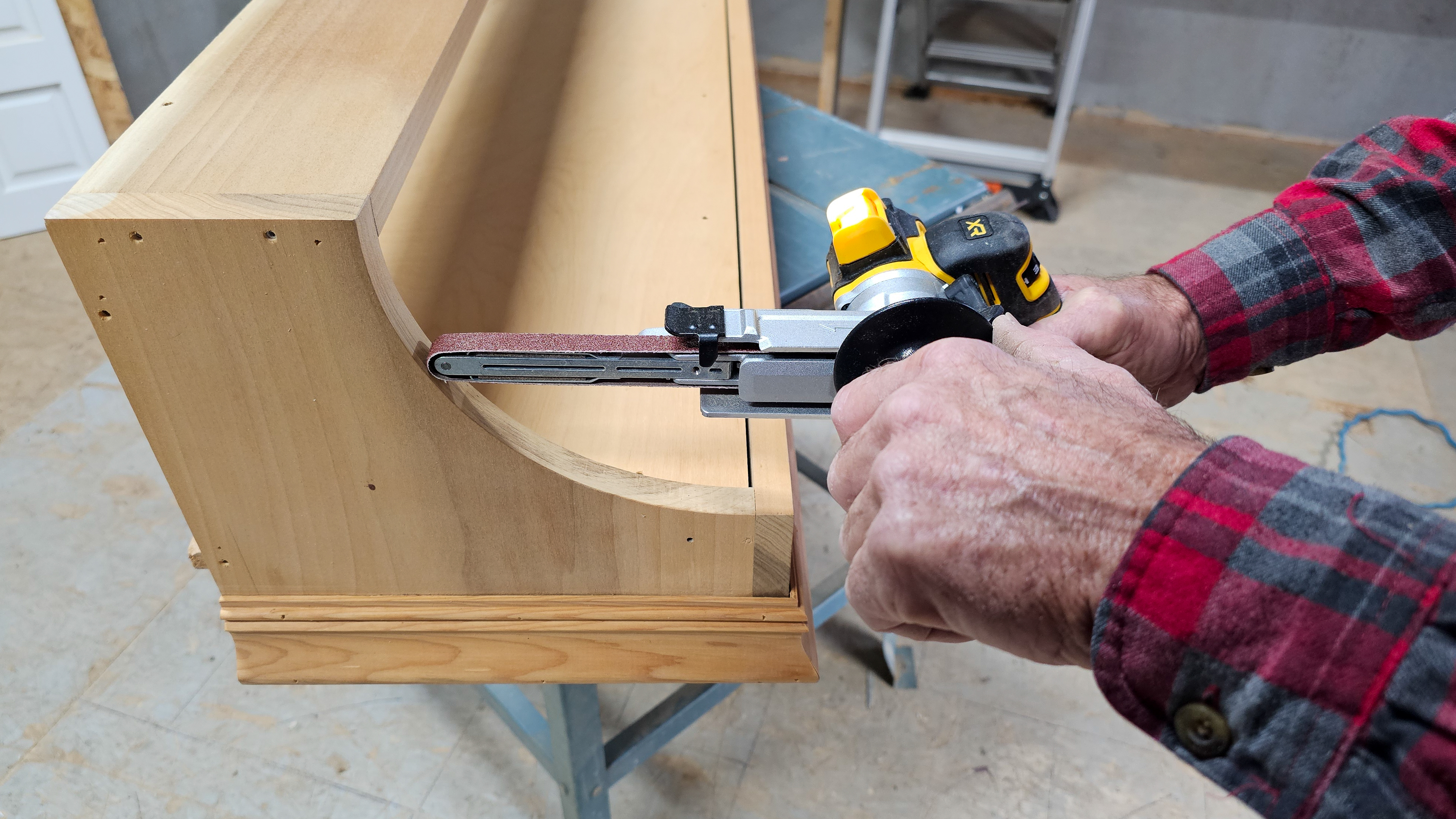 Sanding small lstrip wtih DeWalt belt saw
