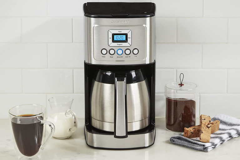 The Best Thermal Carafe Coffee Makers next to a brewed cup of coffee and coffee-making supplies