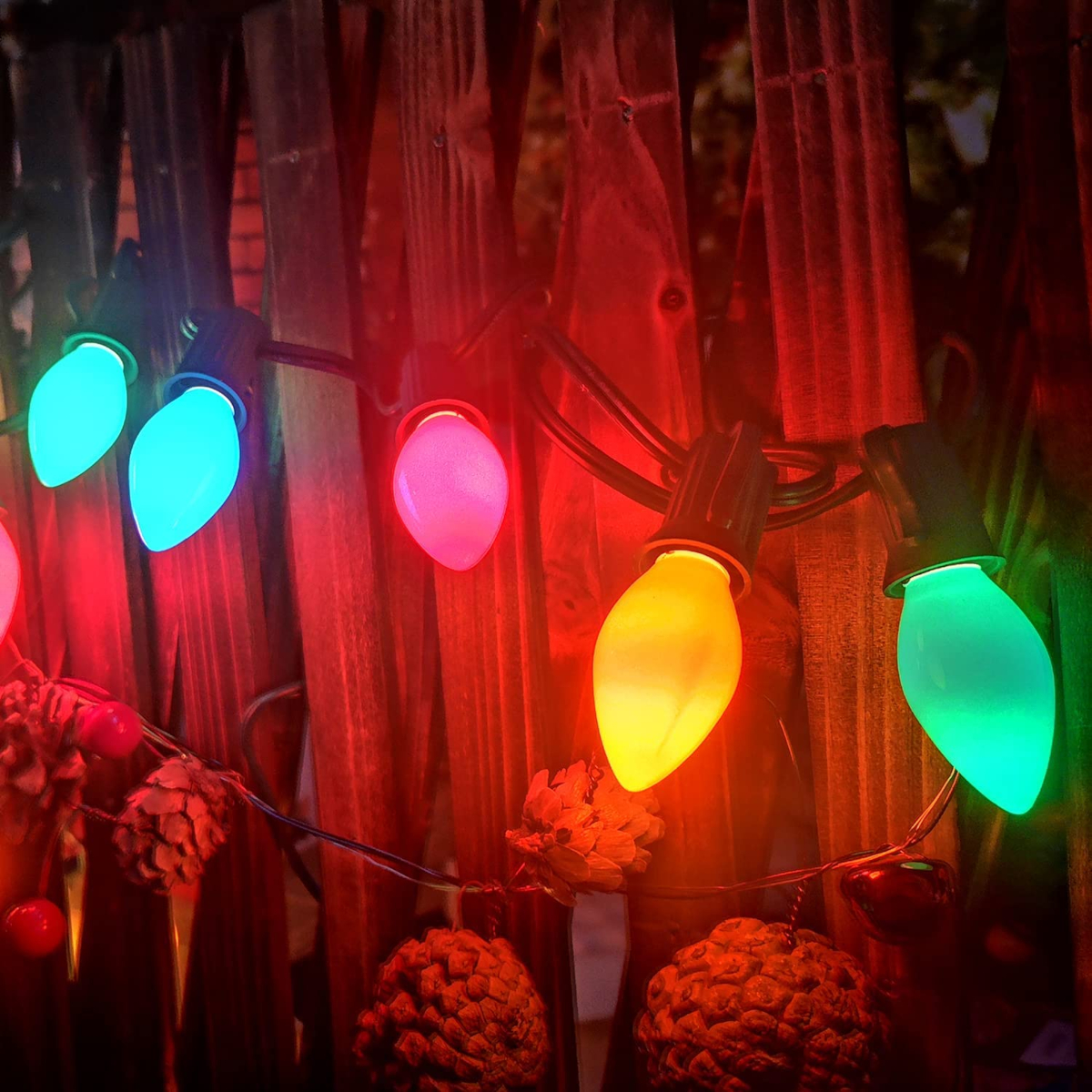 Multicolor outdoor Christmas Lights on a fence