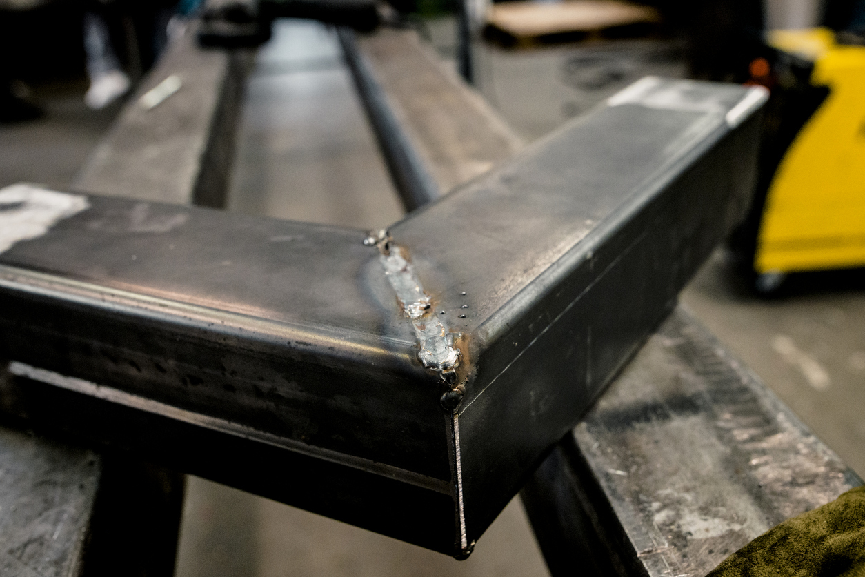 45-degree angle weld of two large iron bars