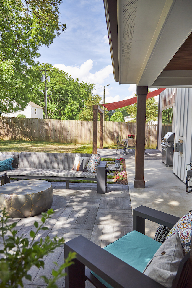 Pavestone patio outdoor living trends 2022 seating around DIY outdoor fireplace