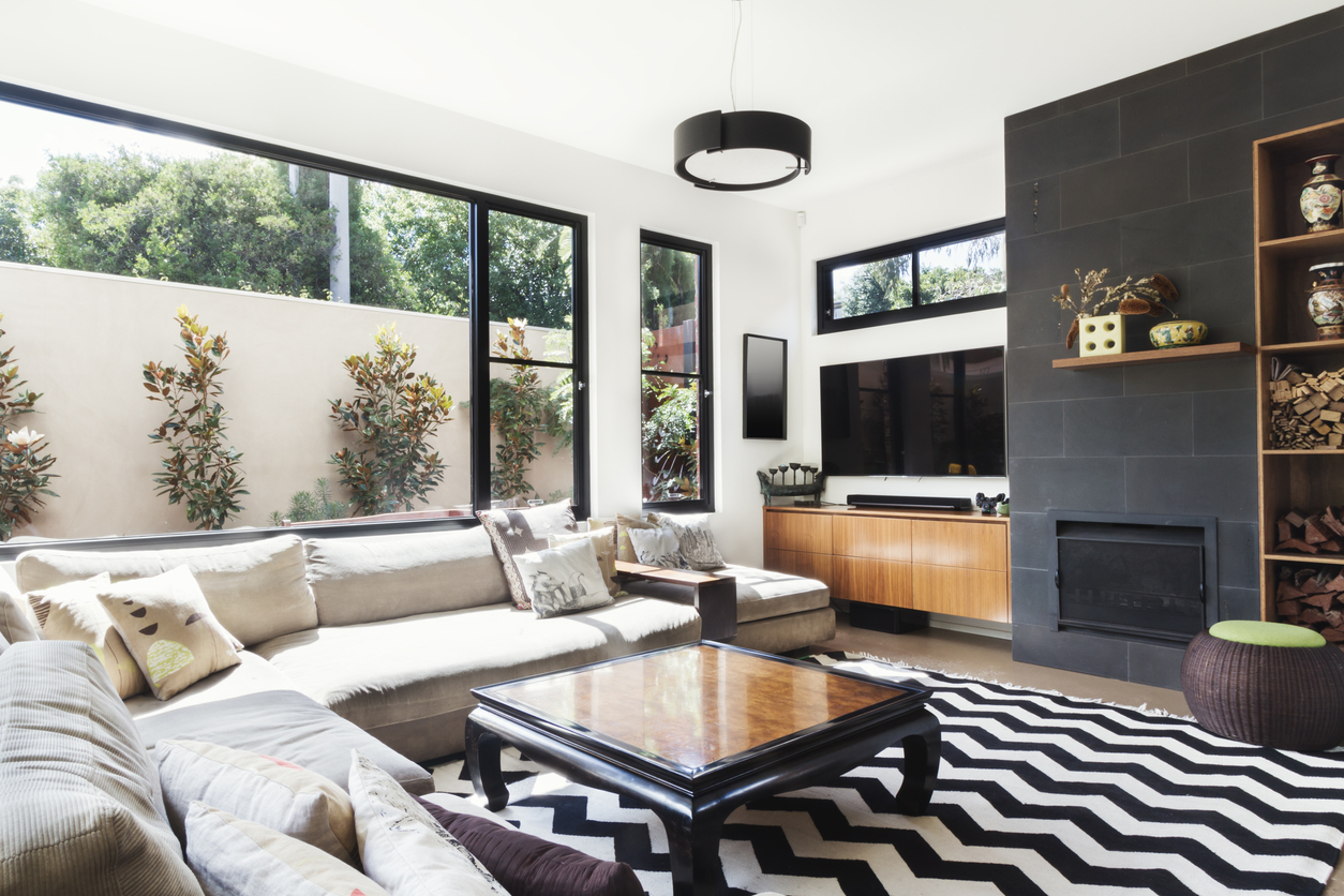 Living room with light walls and black window trim