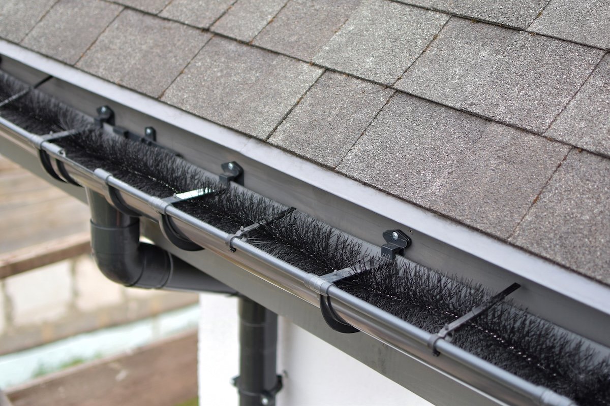 A brush gutter guard on a residential building.
