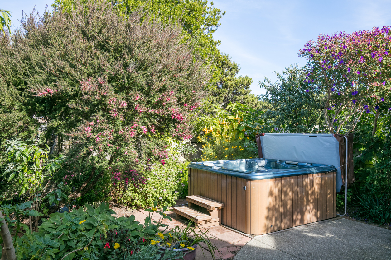 backyard hot tub privacy ideas tree covered