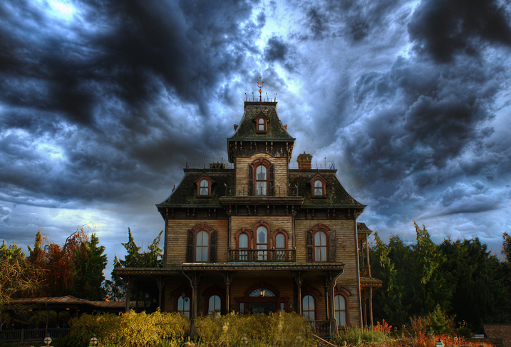 haunted house styles gothic house under clouds