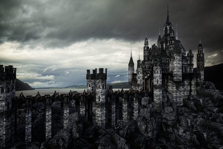 Haunted house styles castle under cloudy sky