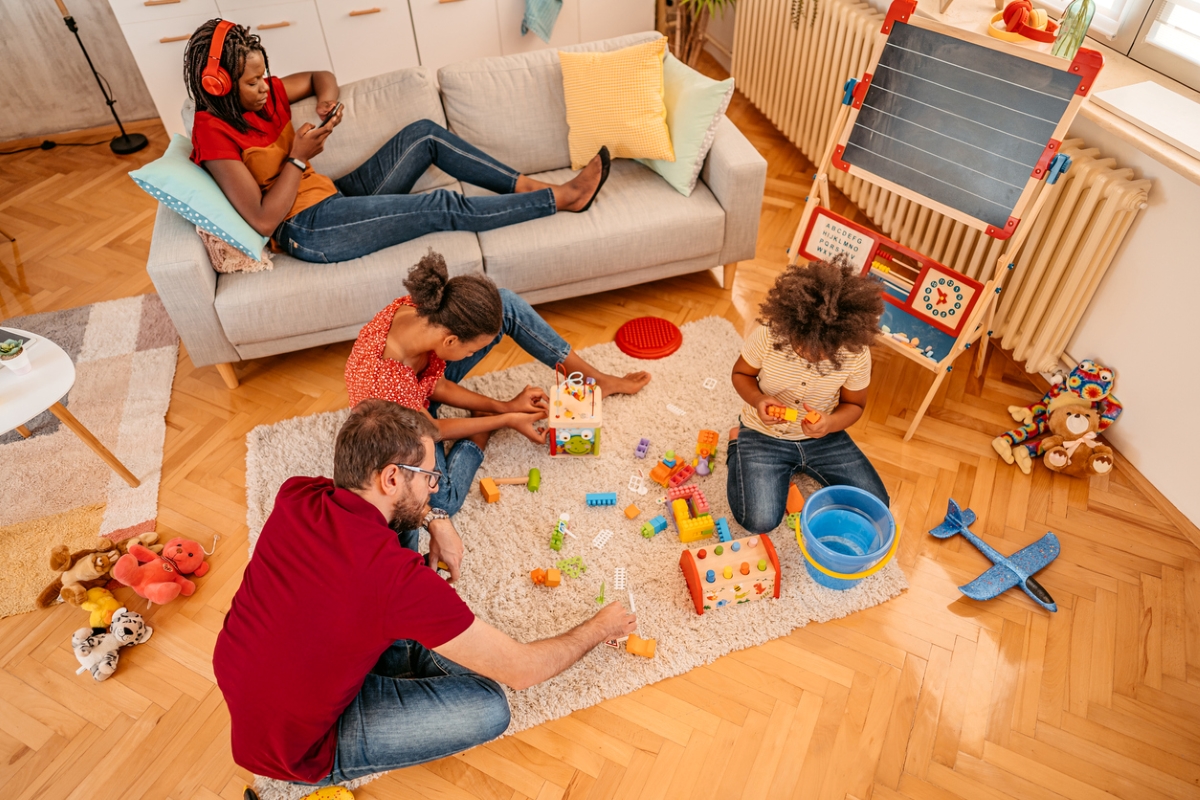 family room vs. living room - family playing