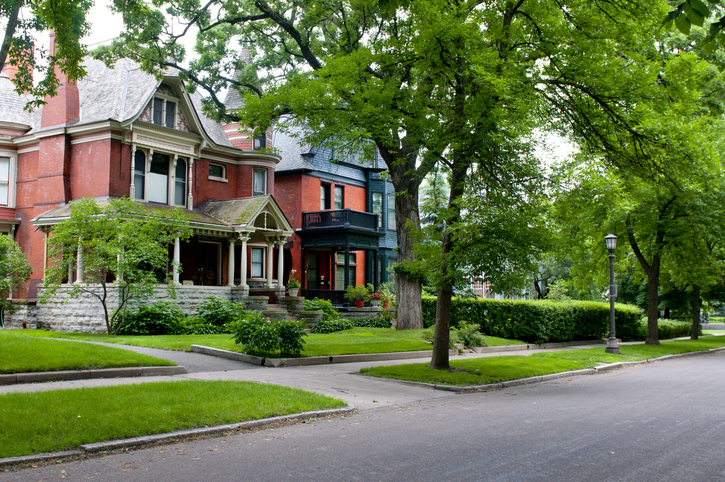 truth about buying and living in old house red victorian house front with large trees