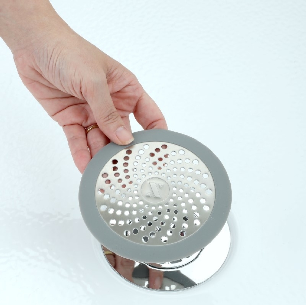 20 Things to Fix Around the House for Under $20 - shower hair catcher