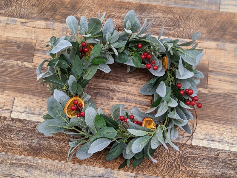 Etsy winter decor ideas wreath with cranberries and oranges