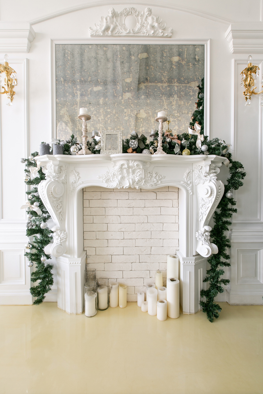 iStock-1076186702 winter decor ideas fireplace garland