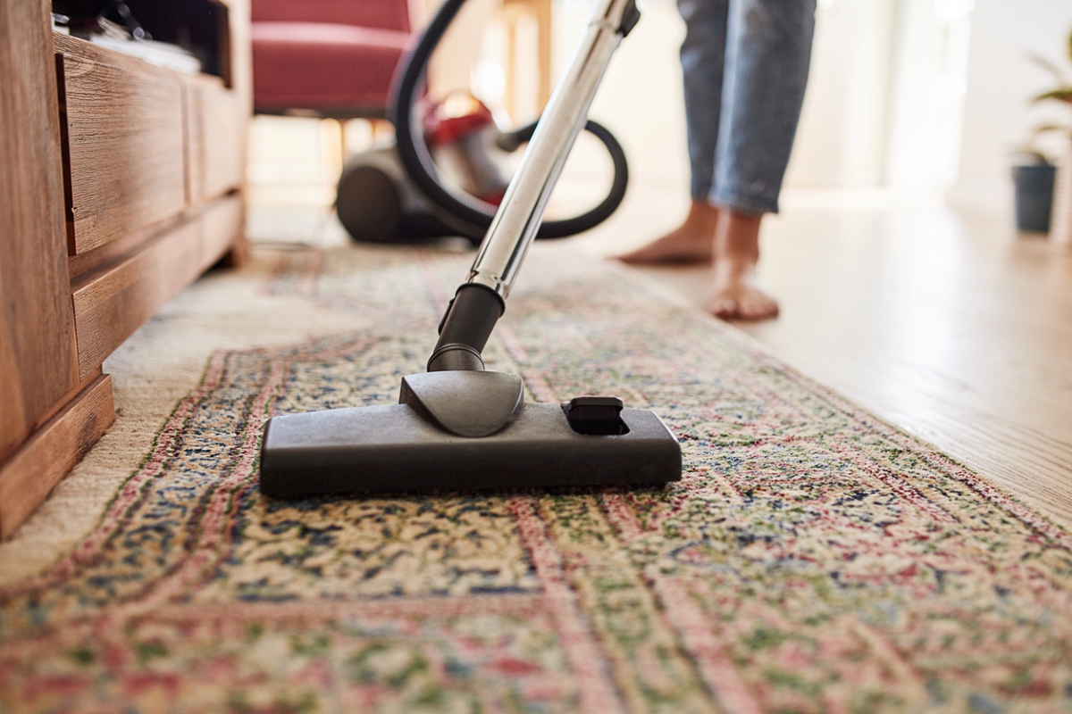 types of rugs - vacuuming rug