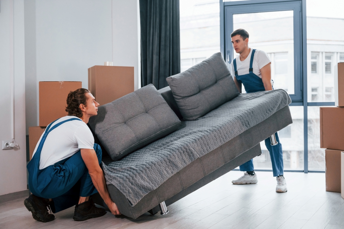 how to get rid of a couch - movers carry couch
