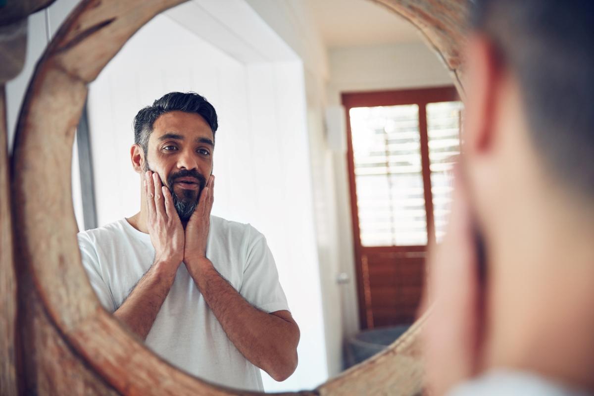 uses for peanut butter - bearded man looking in mirror